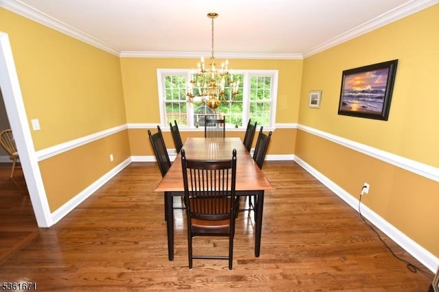 23 Pepperidge Rd, Morris Twp, NJ 07960 - dining area with a chandelier, ornamental molding, baseboards, and wood finished floors