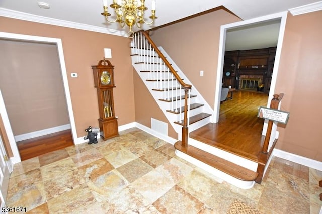 23 Pepperidge Rd, Morris Twp, NJ 07960 - staircase with a chandelier, baseboards, and ornamental molding