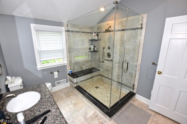 23 Pepperidge Rd, Morris Twp, NJ 07960 - bathroom with vaulted ceiling, baseboards, a shower stall, toilet, and vanity