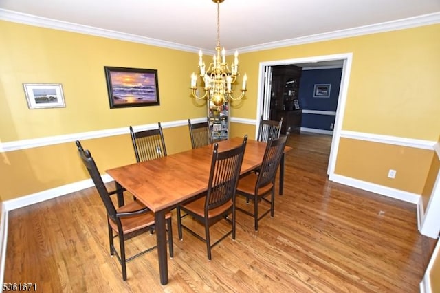 23 Pepperidge Rd, Morris Twp, NJ 07960 - dining area featuring a chandelier, baseboards, ornamental molding, and wood finished floors