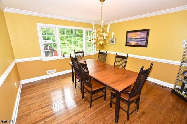 23 Pepperidge Rd, Morris Twp, NJ 07960 - dining room with a chandelier, ornamental molding, wood finished floors, and baseboards