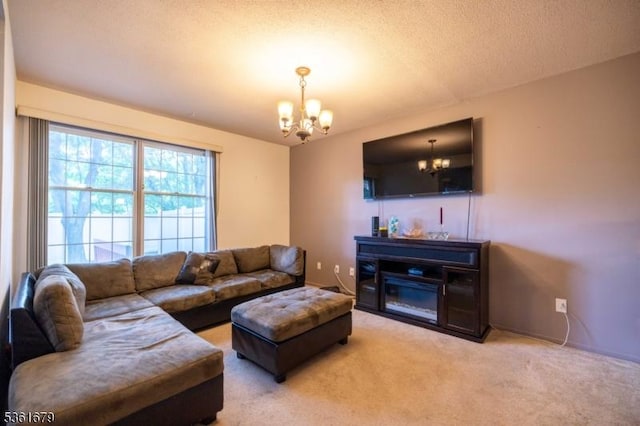 17 Iron Forge Vlg S, Pompton Lakes Boro, NJ 07442 - living area with a chandelier and light colored carpet