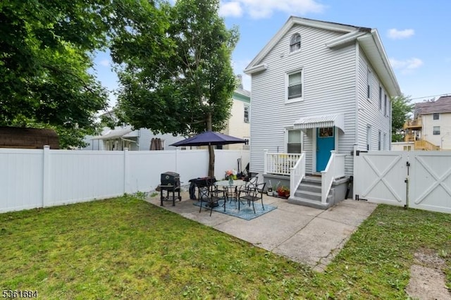 46 Harmony St, North Plainfield Boro, NJ 07060 - rear view of house featuring a gate, a fenced backyard, and a patio area