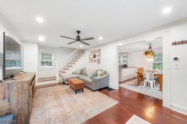 328 John St, Bound Brook Boro, NJ 08805 - living room with stairs, dark wood finished floors, crown molding, recessed lighting, and a chandelier