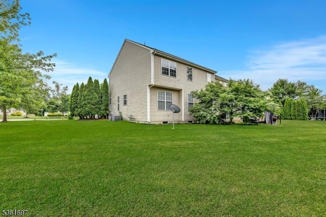 7 Westbury Dr, Winslow Twp, NJ 08009 - back of house featuring central air condition unit and a lawn