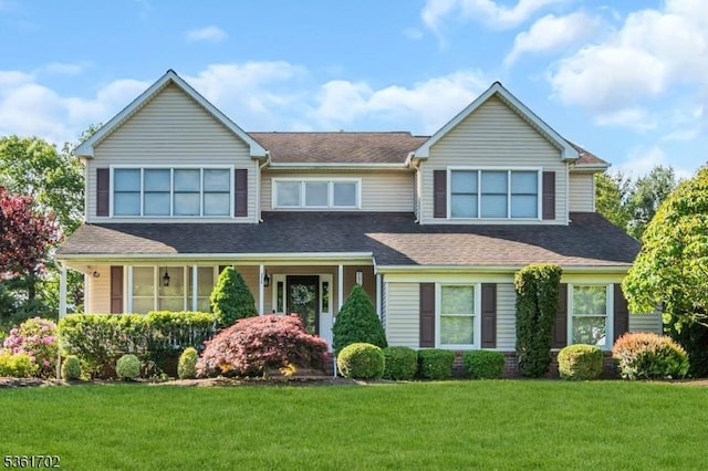 11 Wesley Rd, Hillsborough Twp, NJ 08844 - view of front of home with a front yard and a shingled roof