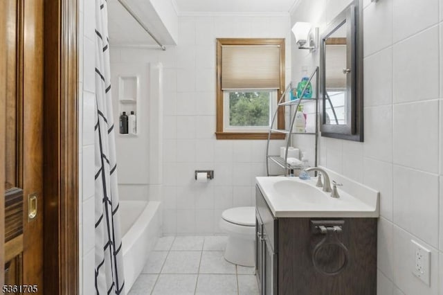 35 Woodward Ave, Bloomingdale Boro, NJ 07403 - bathroom with tile walls, toilet, ornamental molding, vanity, and tile patterned flooring