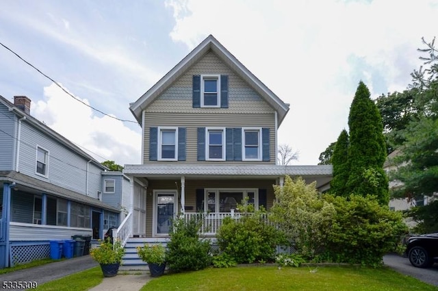 7 Clinton St, Morristown Town, NJ 07960 - victorian-style house with covered porch and a front yard