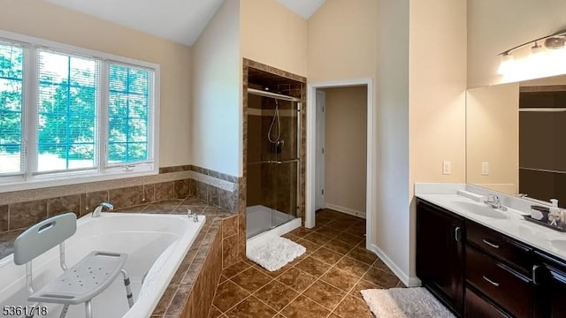 2 Murphy Dr, Hillsborough Twp, NJ 08844 - full bath with vanity, a bath, a shower stall, tile patterned flooring, and vaulted ceiling
