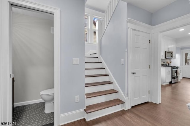 234 Trenton Ave, Clifton City, NJ 07011 - stairway with wood finished floors and baseboards