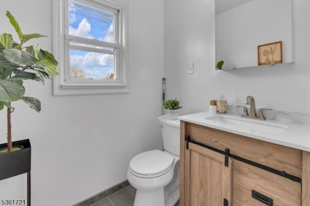 234 Trenton Ave, Clifton City, NJ 07011 - half bathroom featuring vanity, toilet, tile patterned flooring, and baseboards