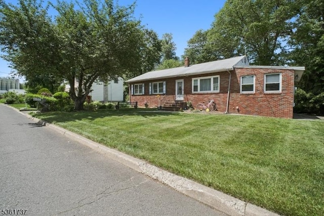 28 Stylon Rd, Wayne Twp, NJ 07470 - single story home featuring brick siding, a front lawn, and a chimney