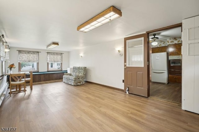 28 Stylon Rd, Wayne Twp, NJ 07470 - living area featuring light wood-style floors and a ceiling fan