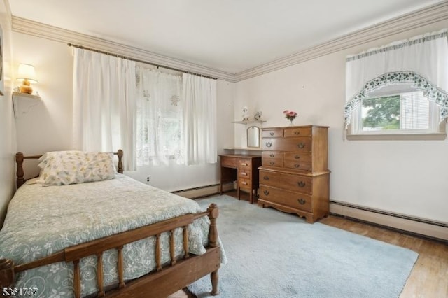 28 Stylon Rd, Wayne Twp, NJ 07470 - bedroom with a baseboard radiator, ornamental molding, and wood finished floors