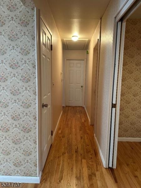28 Stylon Rd, Wayne Twp, NJ 07470 - hall featuring light wood-type flooring and wallpapered walls