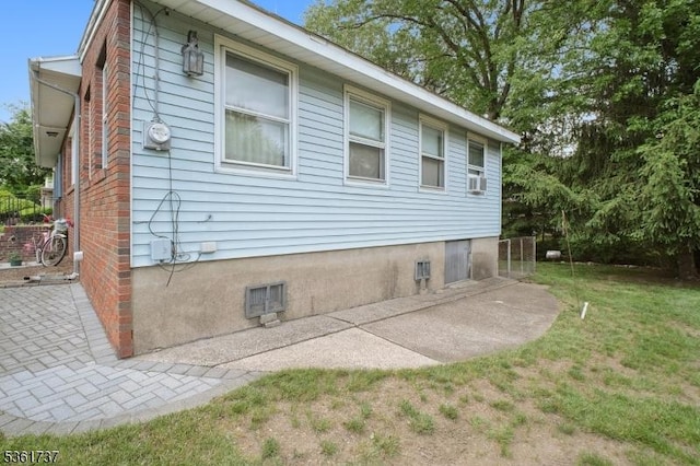 28 Stylon Rd, Wayne Twp, NJ 07470 - view of home's exterior featuring a patio, a yard, and cooling unit