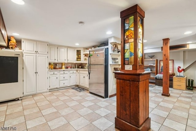 27 Fairway Dr, West Orange Twp, NJ 07052 - kitchen with freestanding refrigerator, fridge, recessed lighting, decorative backsplash, and white cabinetry