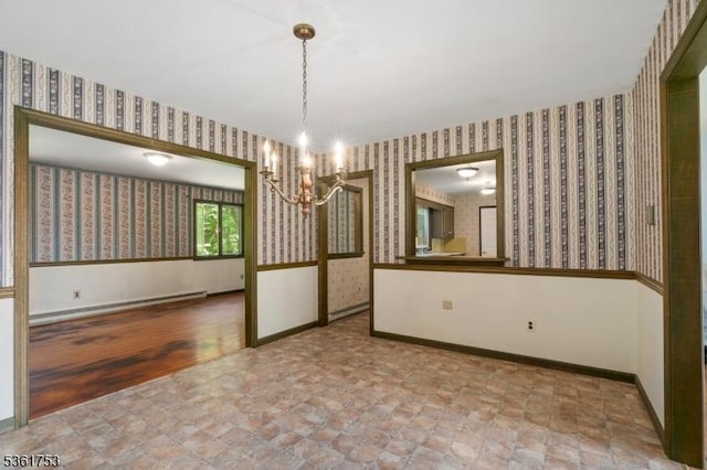 3 Bingham Ln, Blairstown Twp, NJ 07825 - empty room featuring wallpapered walls, a chandelier, baseboard heating, baseboards, and stone finish flooring