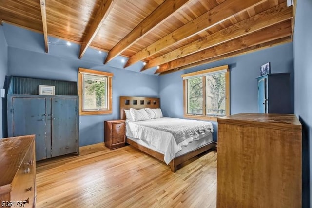 172 Alpine Trl, Sparta Twp, NJ 07871 - bedroom featuring multiple windows, light wood-style flooring, and wood ceiling with exposed beams