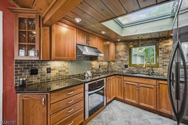 172 Alpine Trl, Sparta Twp, NJ 07871 - kitchen with oven, a sink, under cabinet range hood, black electric cooktop, and a skylight