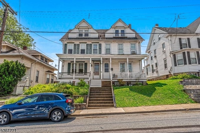 94 Bullman St, Phillipsburg Town, NJ 08865 - view of property featuring covered porch, stairway, and a front yard
