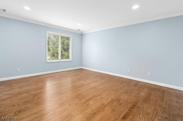 11 Putnam Ave, Berkeley Heights Twp, NJ 07922 - spare room featuring crown molding, baseboards, recessed lighting, and wood finished floors