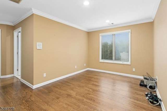 11 Putnam Ave, Berkeley Heights Twp, NJ 07922 - empty room with ornamental molding, wood finished floors, baseboards, and recessed lighting