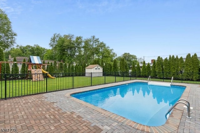 11 Putnam Ave, Berkeley Heights Twp, NJ 07922 - view of swimming pool with a playground, a patio, and view of wooded area
