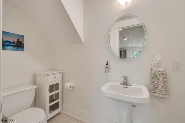 20 Pinehurst Dr, Washington Twp, NJ 07882 - half bathroom with toilet, a sink, tile patterned floors, and baseboards