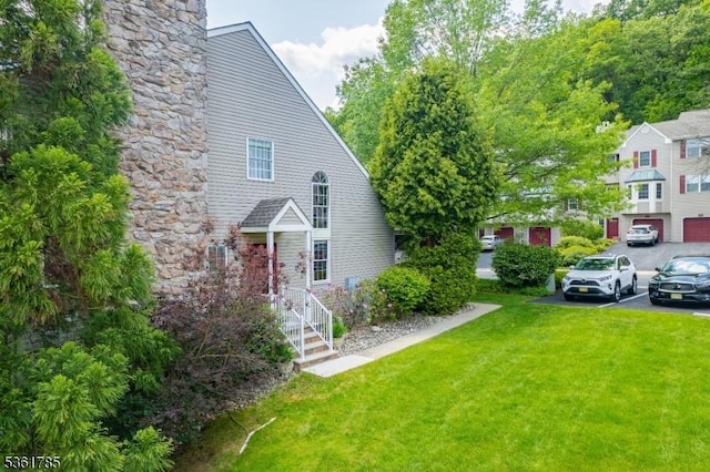 20 Pinehurst Dr, Washington Twp, NJ 07882 - view of property exterior with a lawn and a chimney