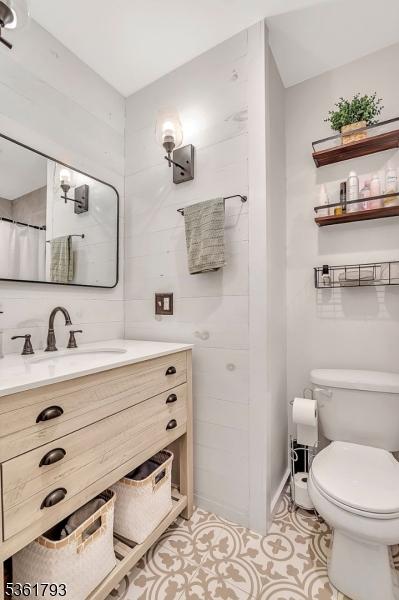 31 Center St, Netcong Boro, NJ 07857 - bathroom featuring vanity, toilet, and tile patterned flooring