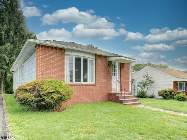 136 Tooker Ave, Springfield Twp, NJ 07081 - view of front of property featuring brick siding, a front lawn, and entry steps