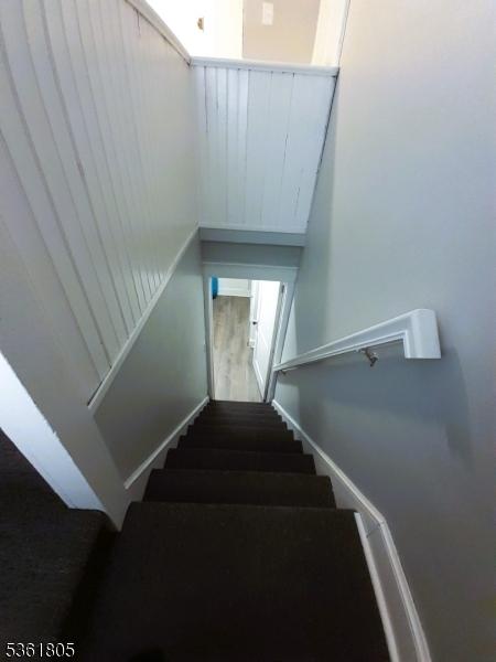 336 E 41st St, Paterson City, NJ 07504 - staircase with wood finished floors