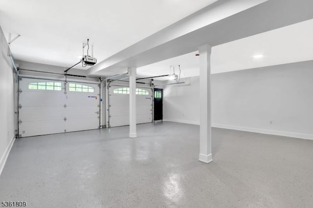 23 Meadow Ln, Sparta Twp, NJ 07871 - garage with baseboards and a garage door opener