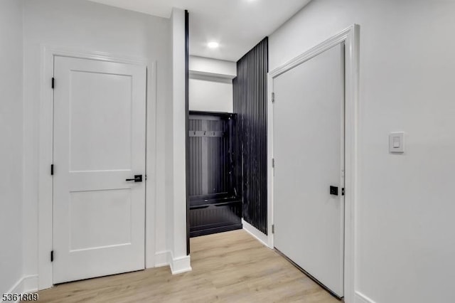 23 Meadow Ln, Sparta Twp, NJ 07871 - corridor featuring light wood-type flooring