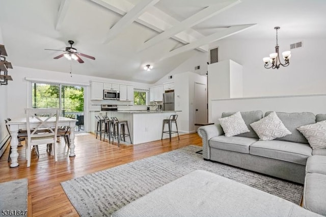 80 Cedar Tree Dr, Vernon Twp, NJ 07422 - living area with a chandelier, ceiling fan, and light wood-style flooring