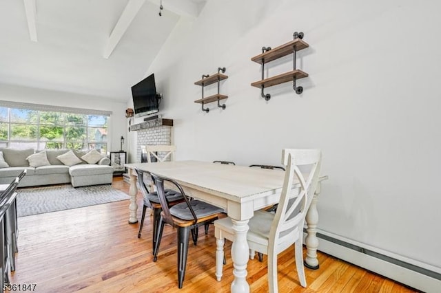 80 Cedar Tree Dr, Vernon Twp, NJ 07422 - dining space featuring baseboard heating, a fireplace, light wood finished floors, beamed ceiling, and high vaulted ceiling