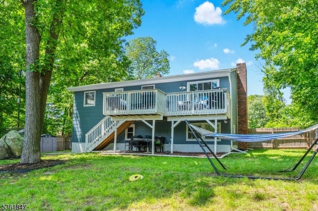 80 Cedar Tree Dr, Vernon Twp, NJ 07422 - rear view of house featuring a wooden deck, a chimney, and stairway