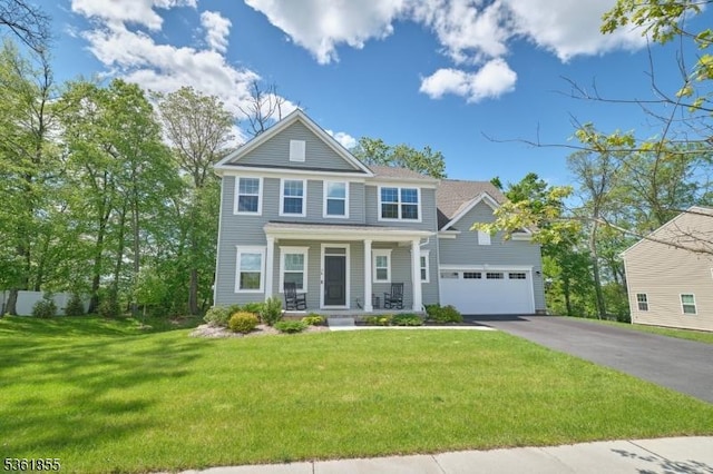 16 Esposito Ln, Roxbury Twp, NJ 07850 - view of front of property with a porch, driveway, a garage, and a front lawn