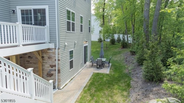 16 Esposito Ln, Roxbury Twp, NJ 07850 - view of green lawn featuring a patio area