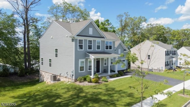 16 Esposito Ln, Roxbury Twp, NJ 07850 - view of front of property featuring a porch, a front lawn, and central AC unit