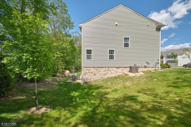 16 Esposito Ln, Roxbury Twp, NJ 07850 - view of side of home with cooling unit and a lawn