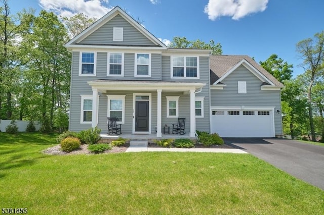 16 Esposito Ln, Roxbury Twp, NJ 07850 - view of front of home featuring covered porch, driveway, and a garage