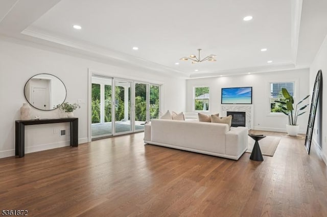 107 Rutland Rd, Glen Rock Boro, NJ 07452 - living area featuring a raised ceiling, wood finished floors, a fireplace, baseboards, and recessed lighting