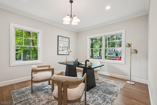 107 Rutland Rd, Glen Rock Boro, NJ 07452 - office with a chandelier, healthy amount of natural light, baseboards, ornamental molding, and wood finished floors