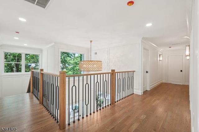 107 Rutland Rd, Glen Rock Boro, NJ 07452 - corridor featuring a decorative wall, wood finished floors, and recessed lighting
