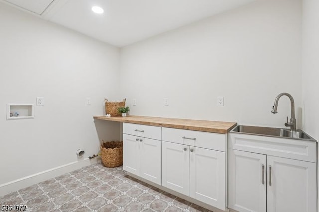 107 Rutland Rd, Glen Rock Boro, NJ 07452 - laundry room featuring hookup for a washing machine, cabinet space, recessed lighting, and baseboards