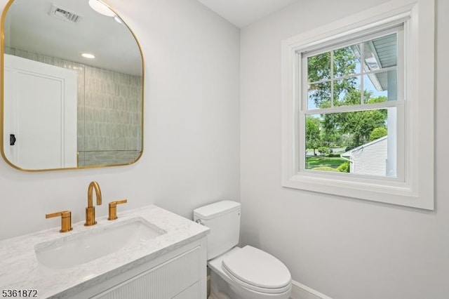 107 Rutland Rd, Glen Rock Boro, NJ 07452 - bathroom with vanity, toilet, and baseboards