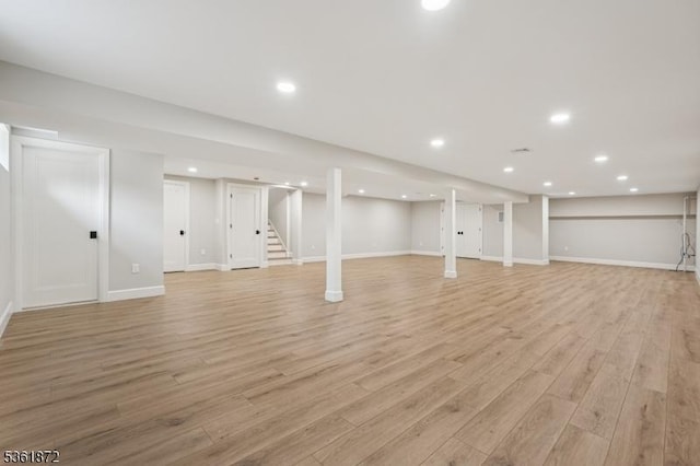 107 Rutland Rd, Glen Rock Boro, NJ 07452 - finished basement featuring light wood finished floors, stairway, baseboards, and recessed lighting