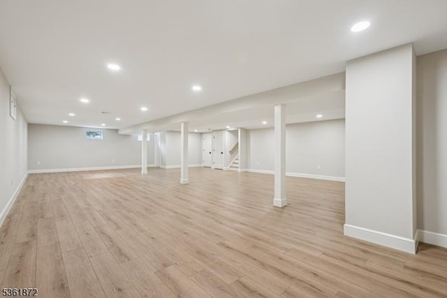107 Rutland Rd, Glen Rock Boro, NJ 07452 - finished below grade area with light wood-style floors, stairs, recessed lighting, and baseboards